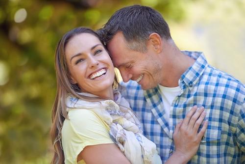 young couple hugging in burke va