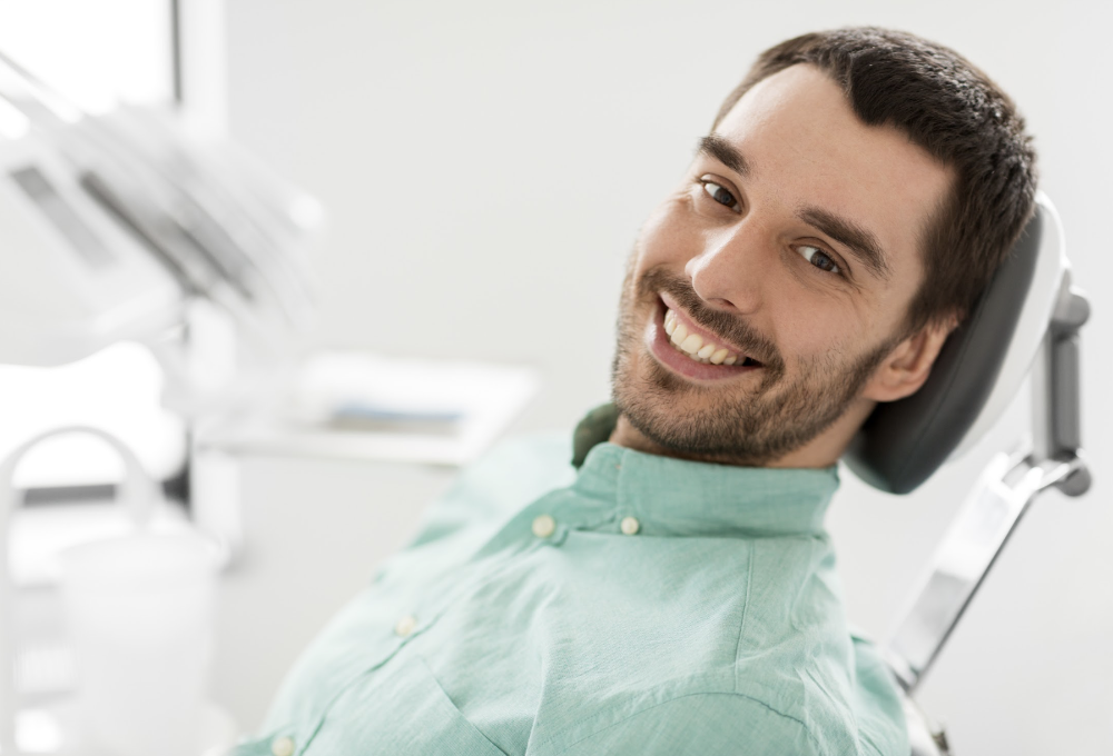 man in a dental chair getting same day crowns in burke