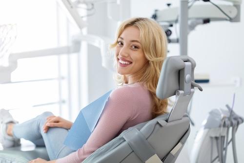 woman getting a tooth extraction in burke va