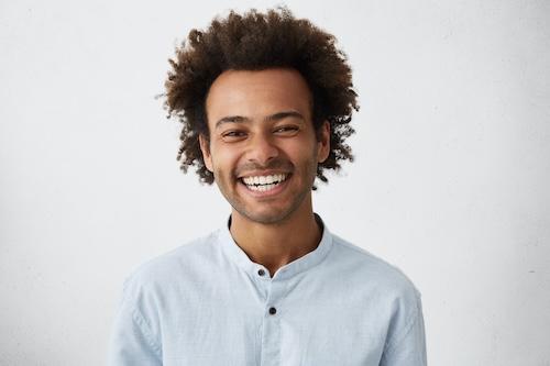 man after a pain free tooth extraction in burke va